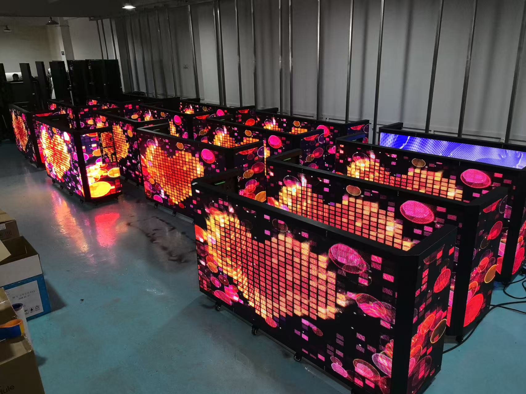 LED DJ booth with pixel graphics